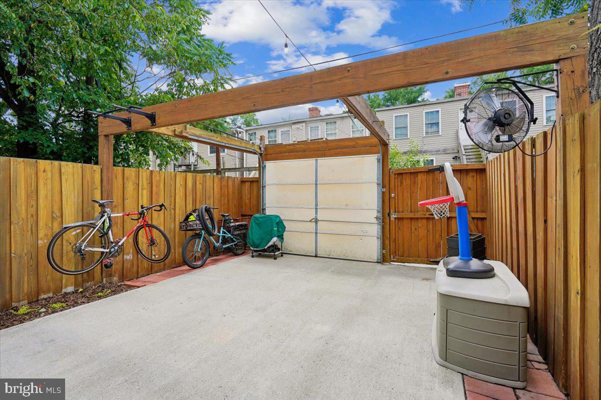 1203 Staples Street Northeast Washington, DC 20002 - Photo 43 of 51 Charming outdoor space with bikes.