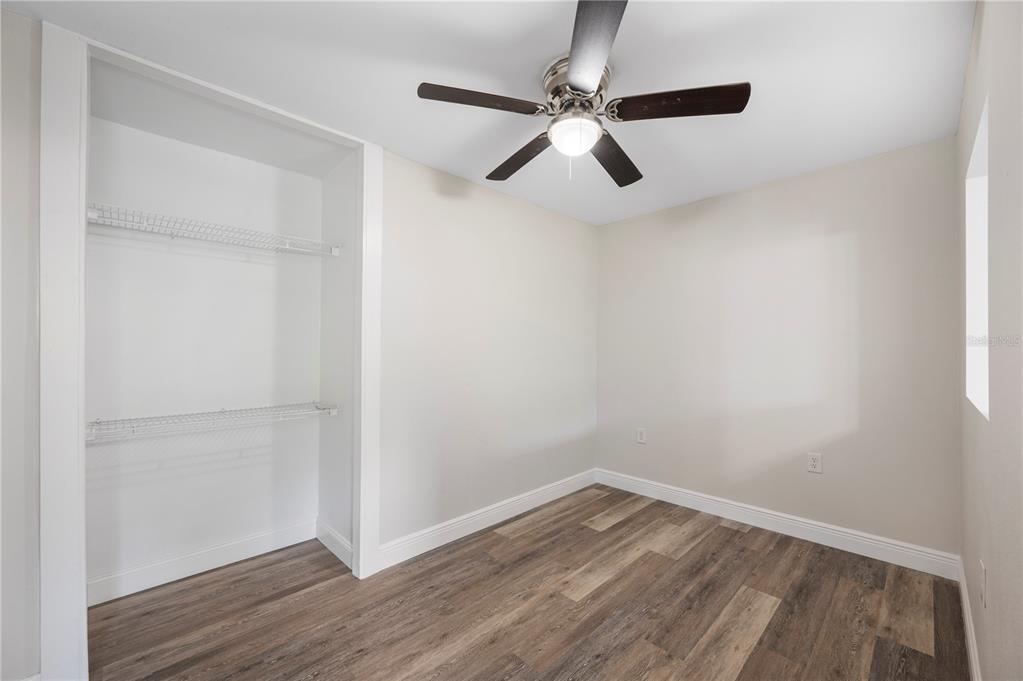 1215 El Camino Road Lakeland, FL 33805 - Photo 28 of 34 a view of an empty room with wooden floor