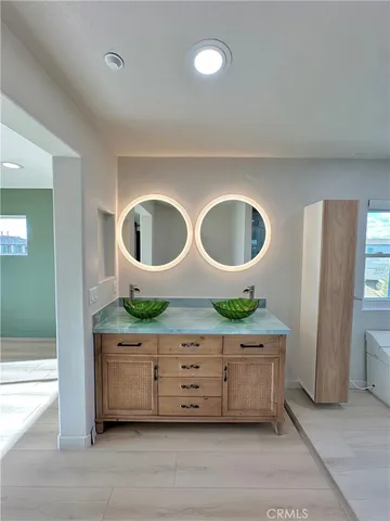 a view of an empty room and a window