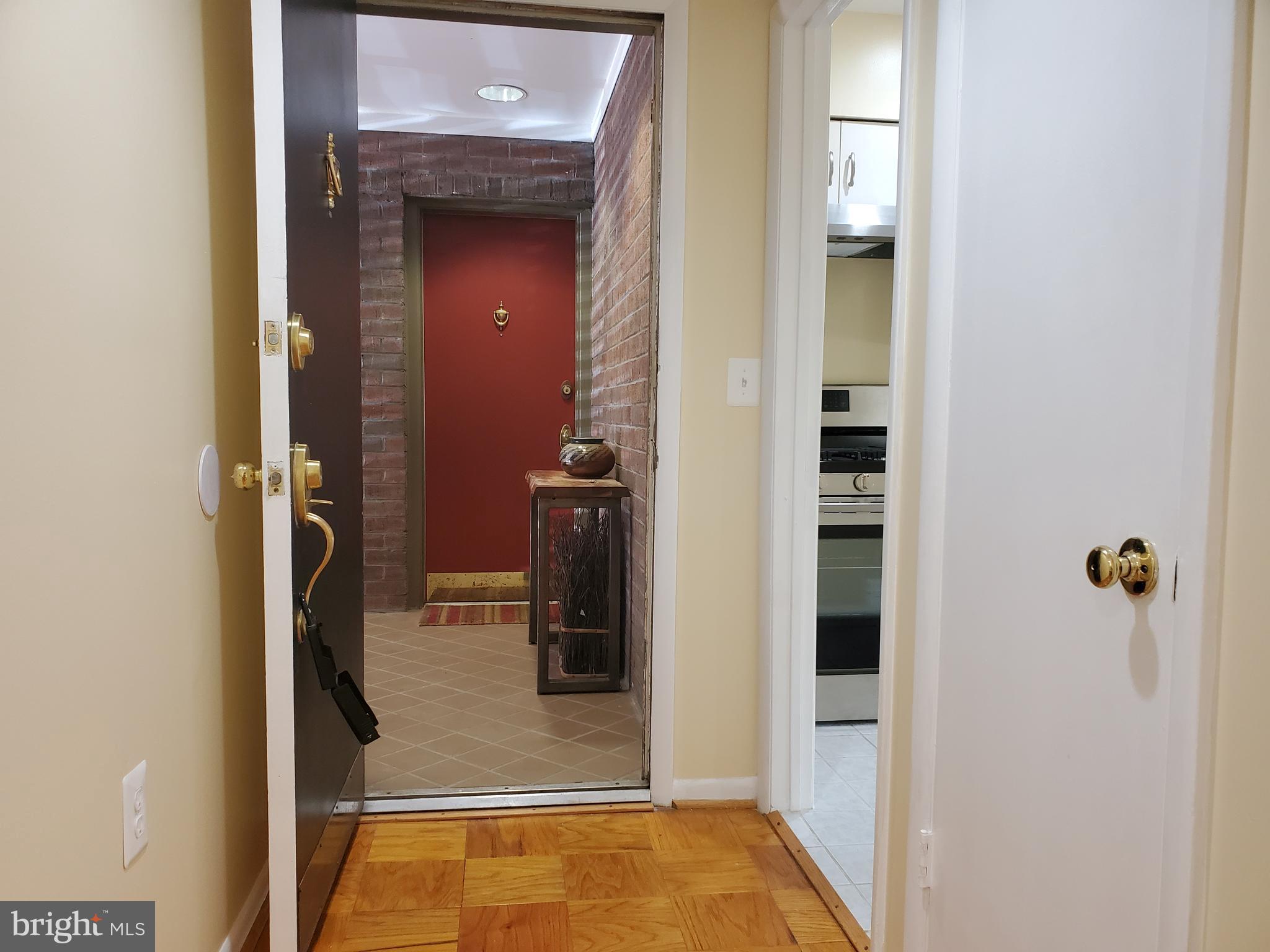117 Cross Keys Road, Unit R117F Baltimore, MD 21210 - Photo 7 of 34 Entrance Foyer by Kitchen
