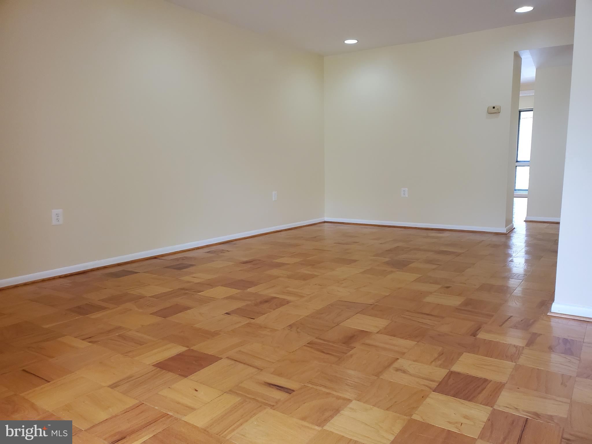 117 Cross Keys Road, Unit R117F Baltimore, MD 21210 - Photo 9 of 34 View of Living Room from Dining Area