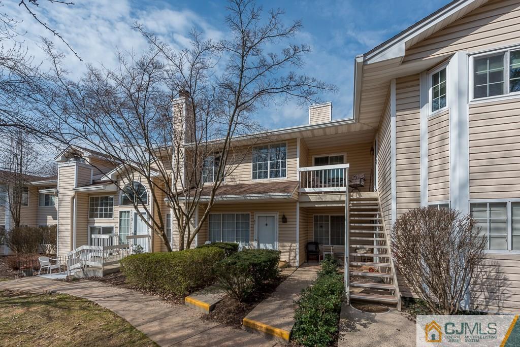 57 Fieldstone Road Bedminster, NJ 07921 - Photo 2 of 22 a front view of a house with garden