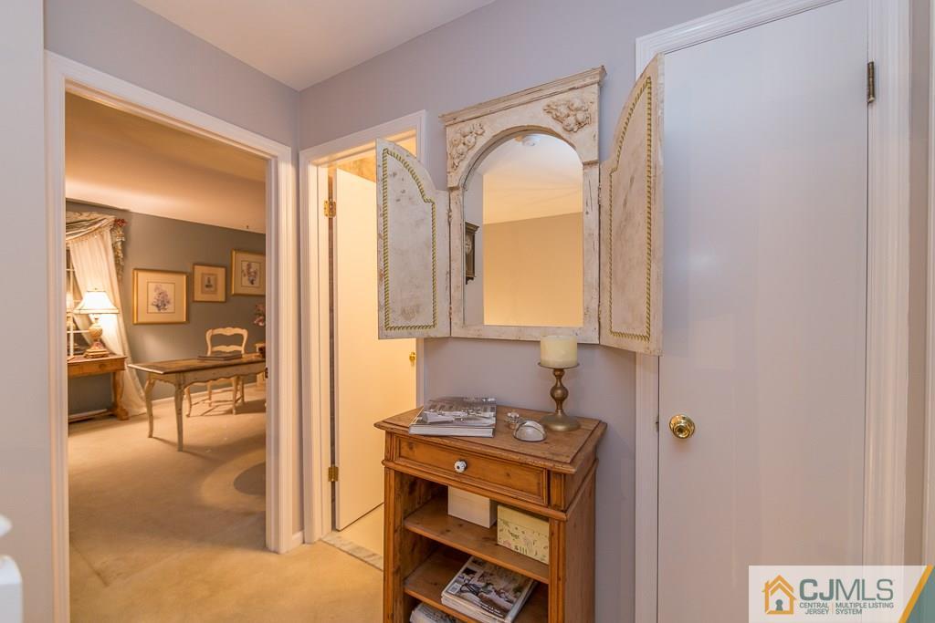 57 Fieldstone Road Bedminster, NJ 07921 - Photo 18 of 22 a living room with furniture and a window