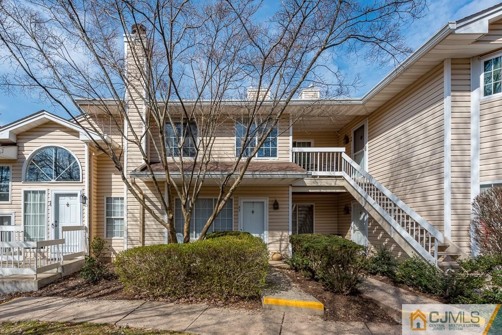 57 Fieldstone Road Bedminster, NJ 07921 - Photo 22 of 22 a front view of a house with a tree