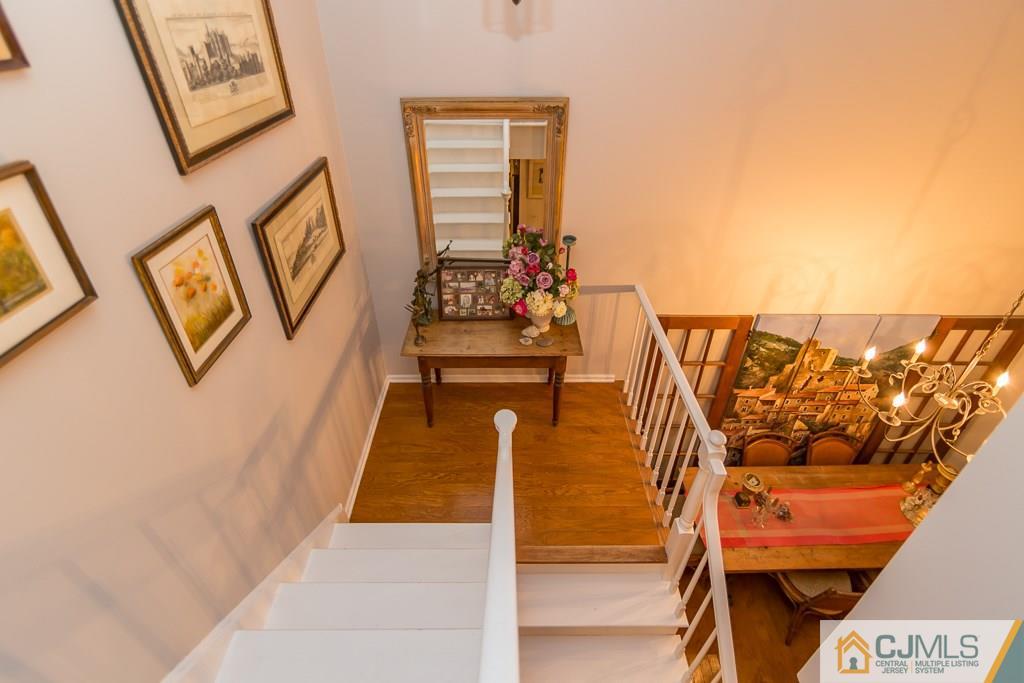 57 Fieldstone Road Bedminster, NJ 07921 - Photo 10 of 22 a hallway with a couch