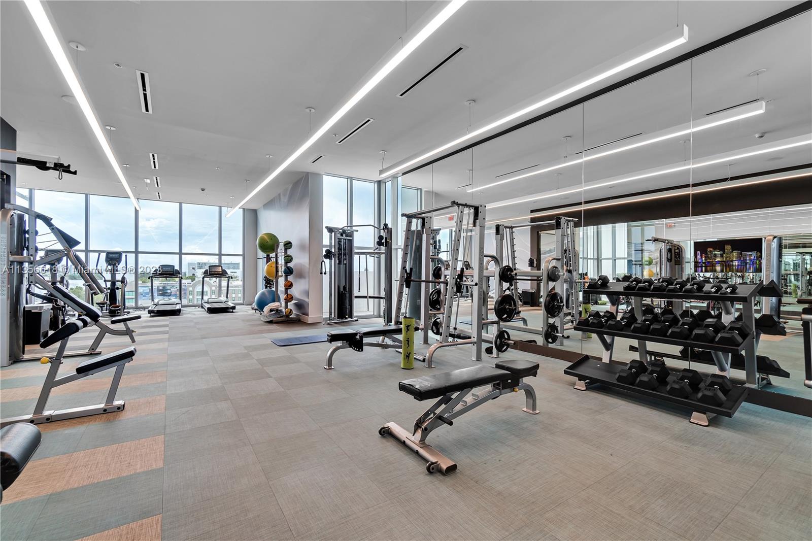 3900 Biscayne Boulevard, Unit S320 Miami, FL 33137 - Photo 31 of 42 a view of a room with gym equipment