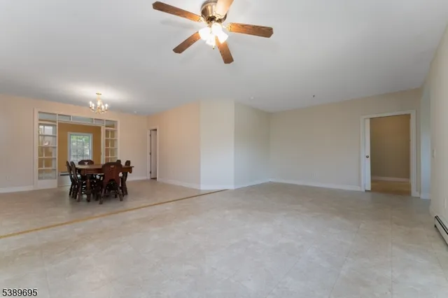 a view of livingroom with furniture and a chandelier