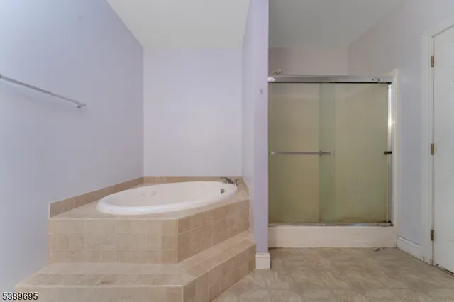 a bathroom with a bath tub