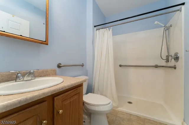 a view of a room with wooden walls