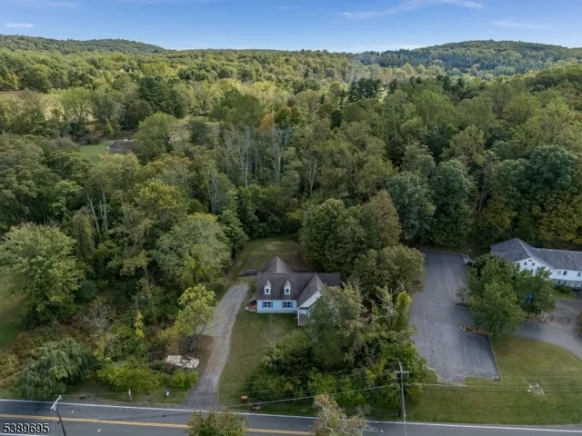 an aerial view of residential house with outdoor space