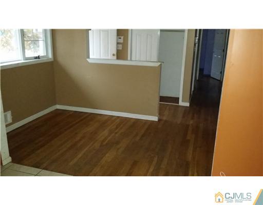 135 Princeton Road Old Bridge, NJ 08859 - Photo 4 of 7 a open area with window