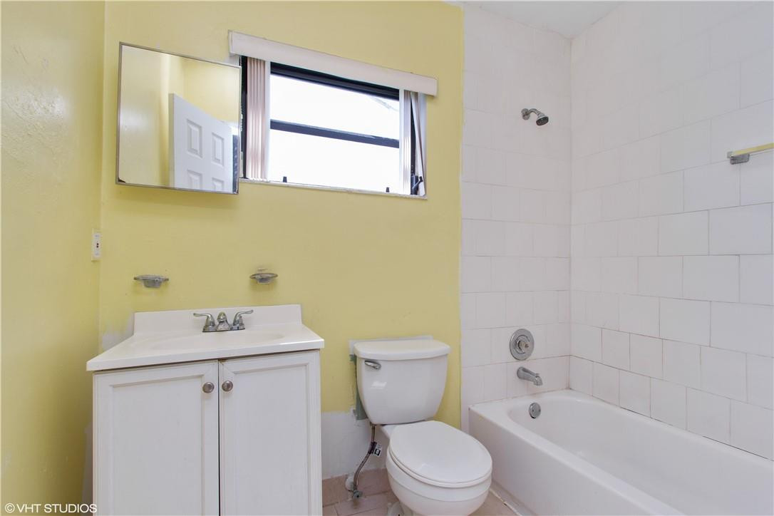 11398 Southwest 227th Terrace Miami, FL 33170 - Photo 6 of 13 a bathroom with a sink toilet and shower