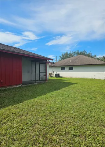 a view of a house with a garden
