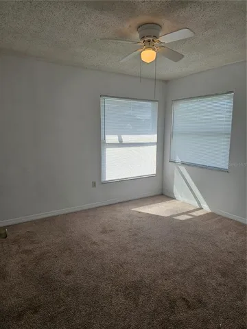 a view of empty room with a window