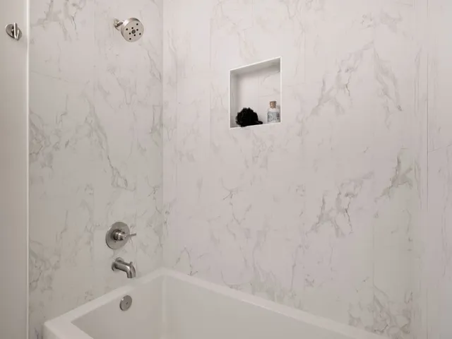 a bathroom with a bathtub