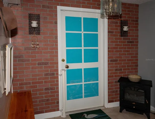 a bathroom with a sink and a window