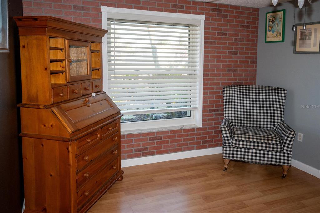 3465 Gulf Lane Rotonda West, FL 33947 - Photo 16 of 42 a view of a kitchen with wooden floor