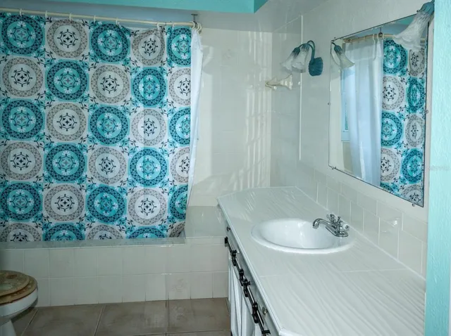 a bathroom with a sink and a tub