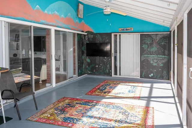 a room that has a bed and a table