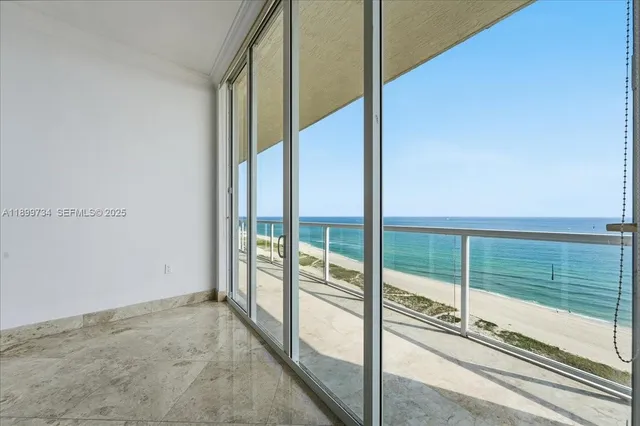 a bathroom with a rug and a shower