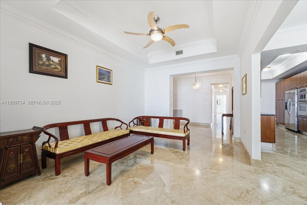 704 North Ocean Boulevard, Unit 1002 Pompano Beach, FL 33062 - Photo 20 of 57 a living room with furniture