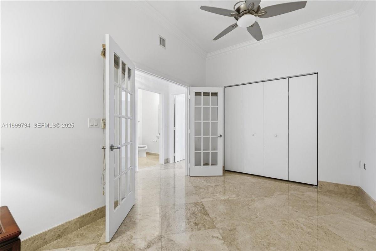 704 North Ocean Boulevard, Unit 1002 Pompano Beach, FL 33062 - Photo 30 of 57 a view of a hallway with wooden floor and entryway