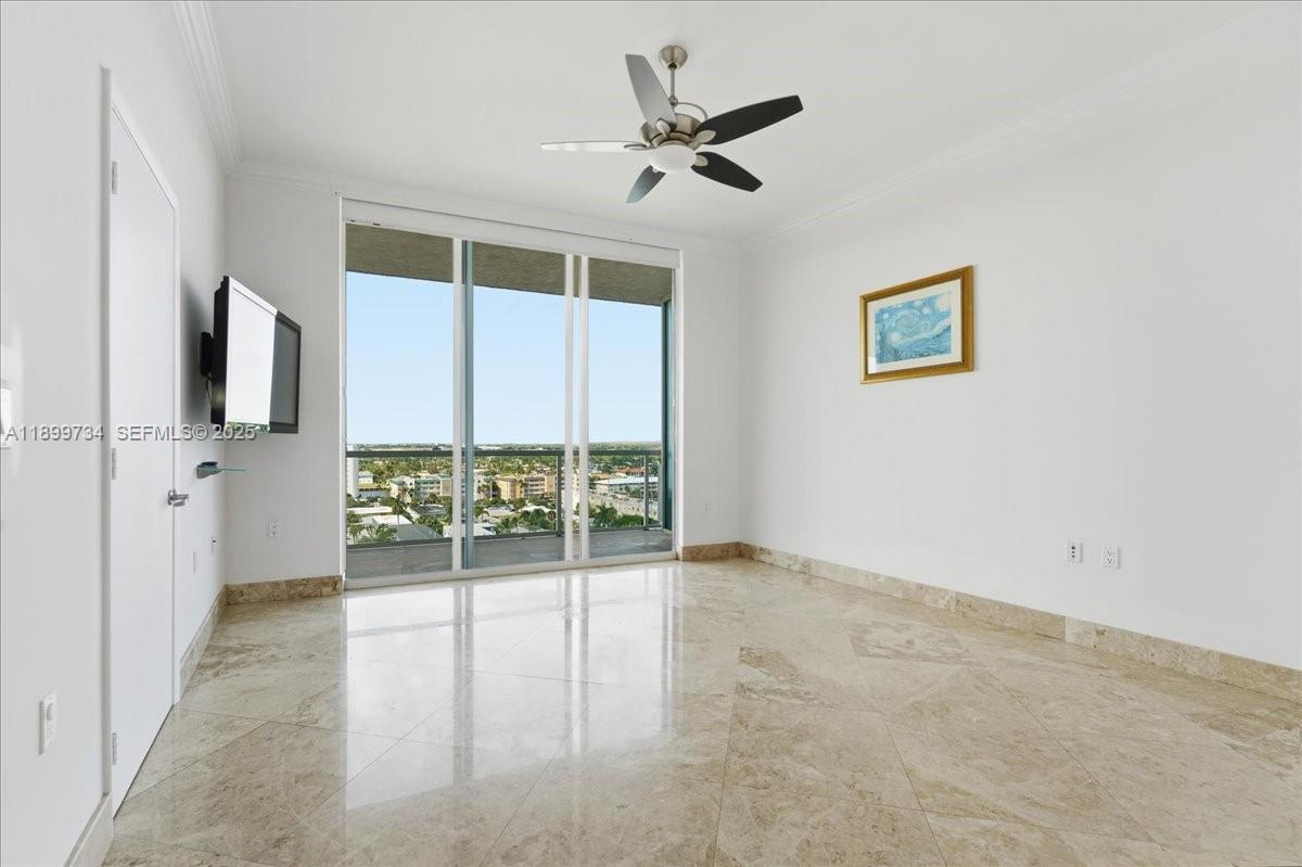704 North Ocean Boulevard, Unit 1002 Pompano Beach, FL 33062 - Photo 32 of 57 a view of an empty room with a window