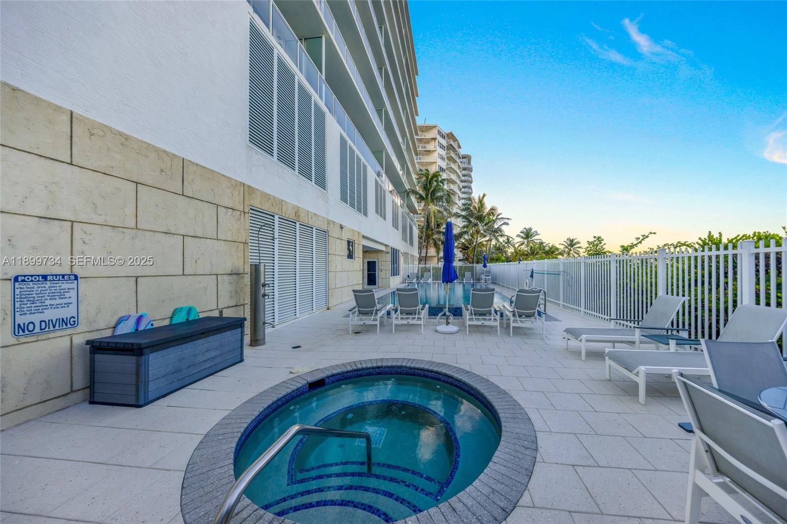 704 North Ocean Boulevard, Unit 1002 Pompano Beach, FL 33062 - Photo 48 of 57 a view of roof deck with table and chairs