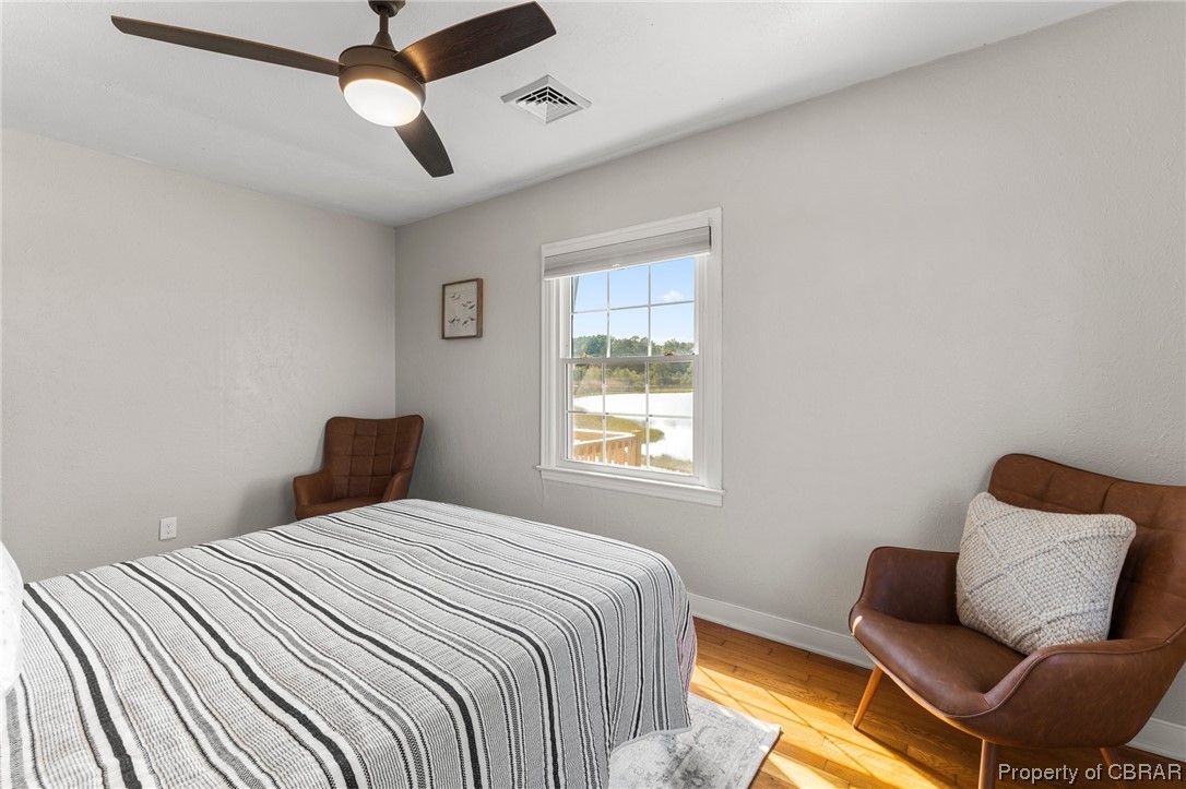 2218 Mill Creek Road Wake, VA 23176 - Photo 31 of 41 Hardwood floored bedroom featuring ceiling fan