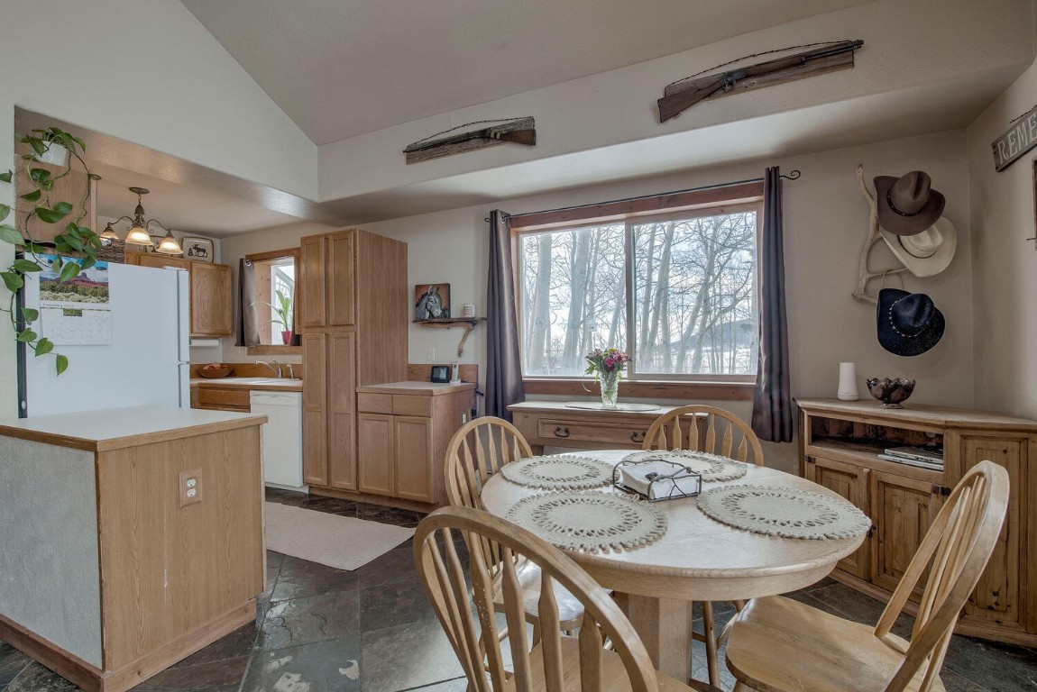 1462 Sheep Ridge Road Fairplay, CO 80440 - Photo 15 of 48 a view of a dining room with furniture window and outside view