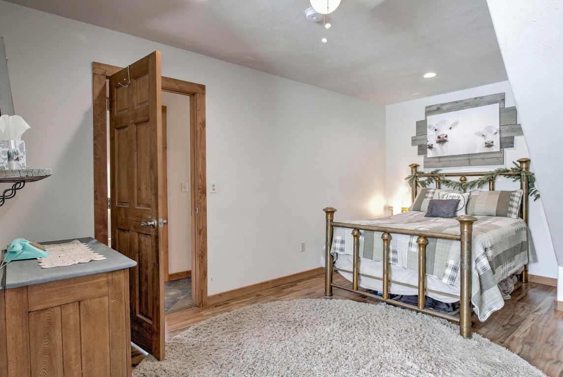 1462 Sheep Ridge Road Fairplay, CO 80440 - Photo 26 of 48 a bedroom with a bed and a table