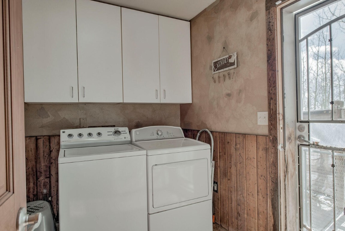 1462 Sheep Ridge Road Fairplay, CO 80440 - Photo 31 of 48 a view of storage and utility room with washer and dryer