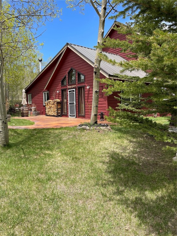 1462 Sheep Ridge Road Fairplay, CO 80440 - Photo 4 of 48 a front view of a house with a yard