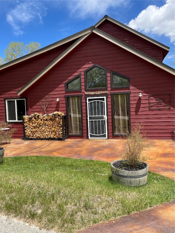 1462 Sheep Ridge Road Fairplay, CO 80440 - Photo 5 of 48 a front view of a house with a yard