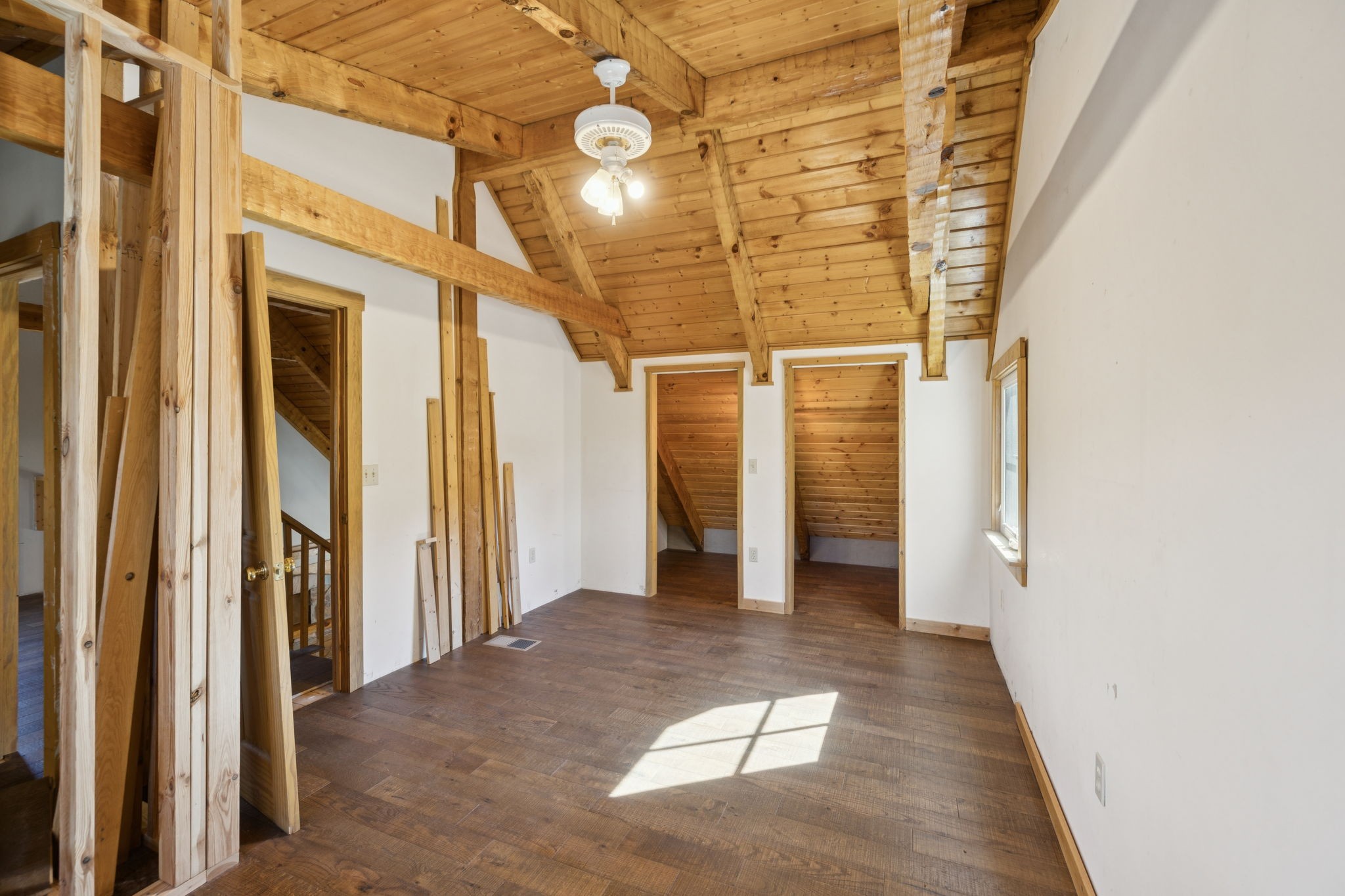 306 Beech Ridge Lane Gatlinburg, TN 37738 - Photo 17 of 24 a view of a hallway with wooden shelves