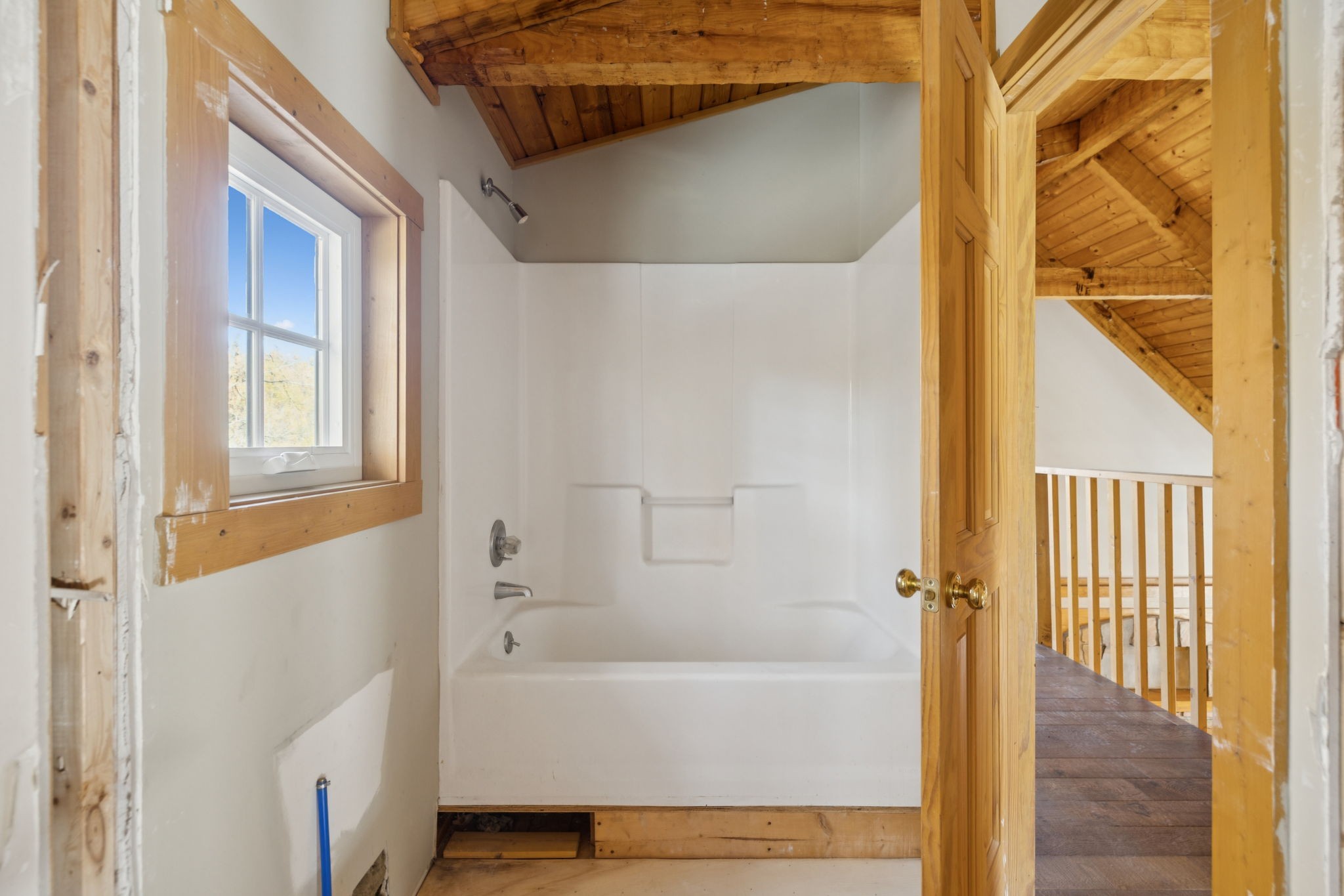 306 Beech Ridge Lane Gatlinburg, TN 37738 - Photo 19 of 24 a bathroom with a bathtub and a shower