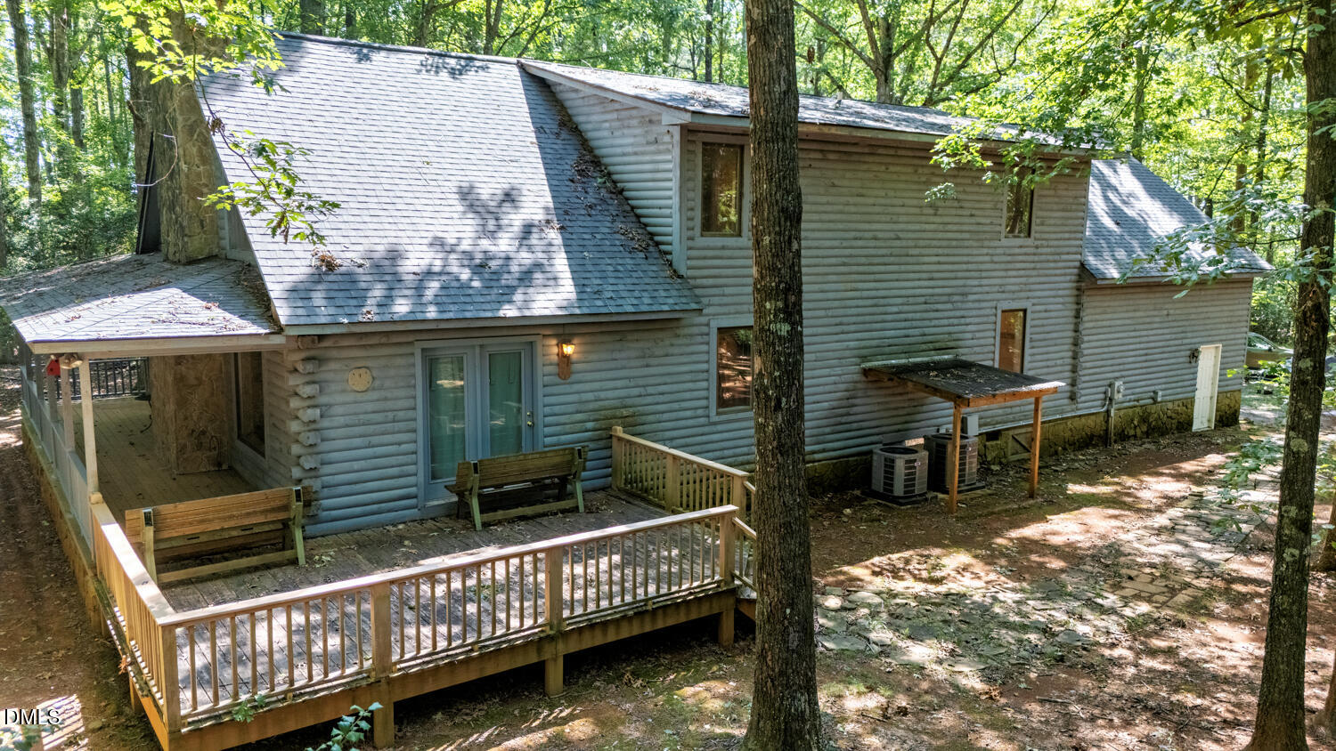 7391 Howerton Road Elon, NC 27244 - Photo 50 of 53 Wood-sided exterior featuring a shingled roof, an exterior deck, and an attached screened-in porch