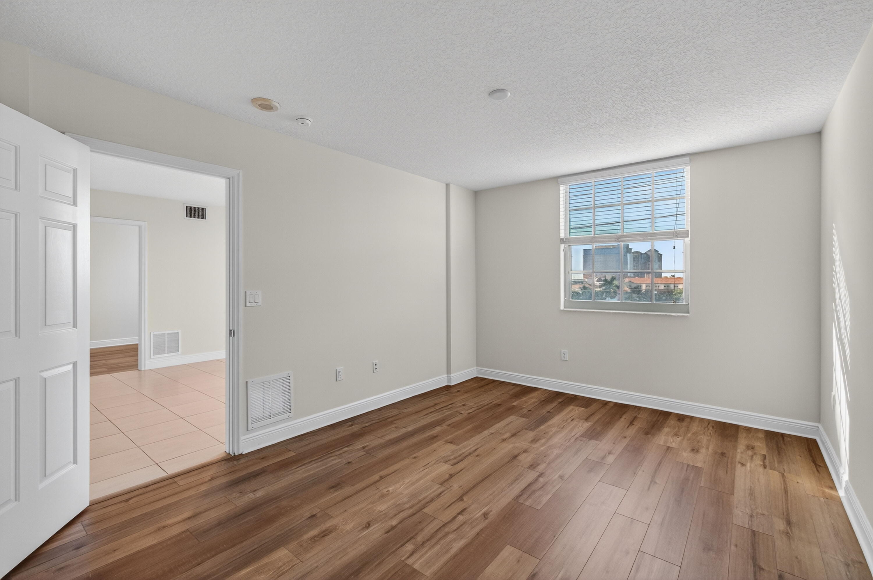 610 Clematis Street, Unit 532 West Palm Beach, FL 33401 - Photo 35 of 63 a view of empty room with wooden floor