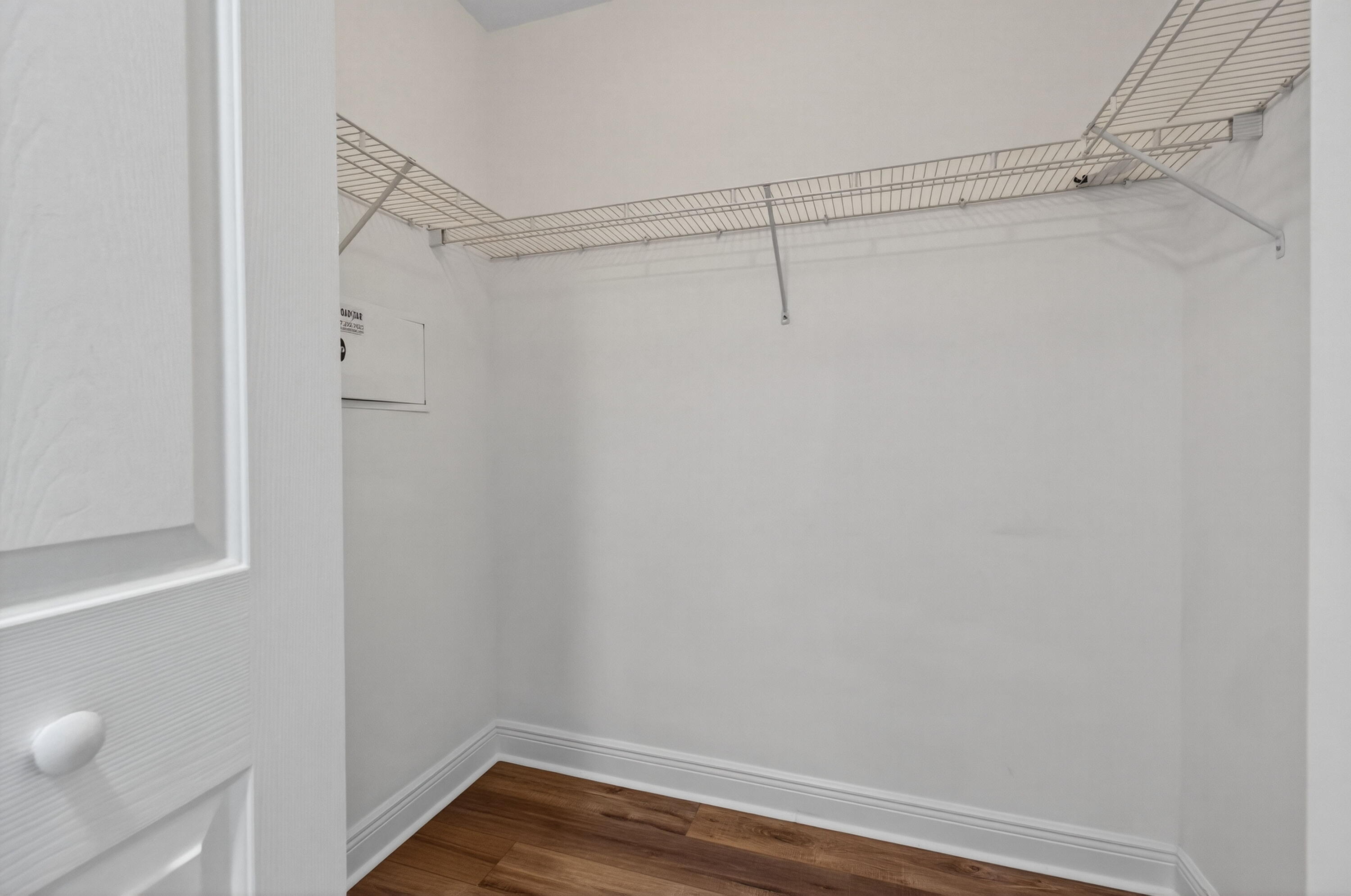 610 Clematis Street, Unit 532 West Palm Beach, FL 33401 - Photo 38 of 63 a view of a room with racks on the wall