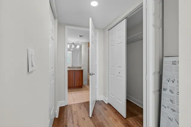 a view of a bathroom from the hallway