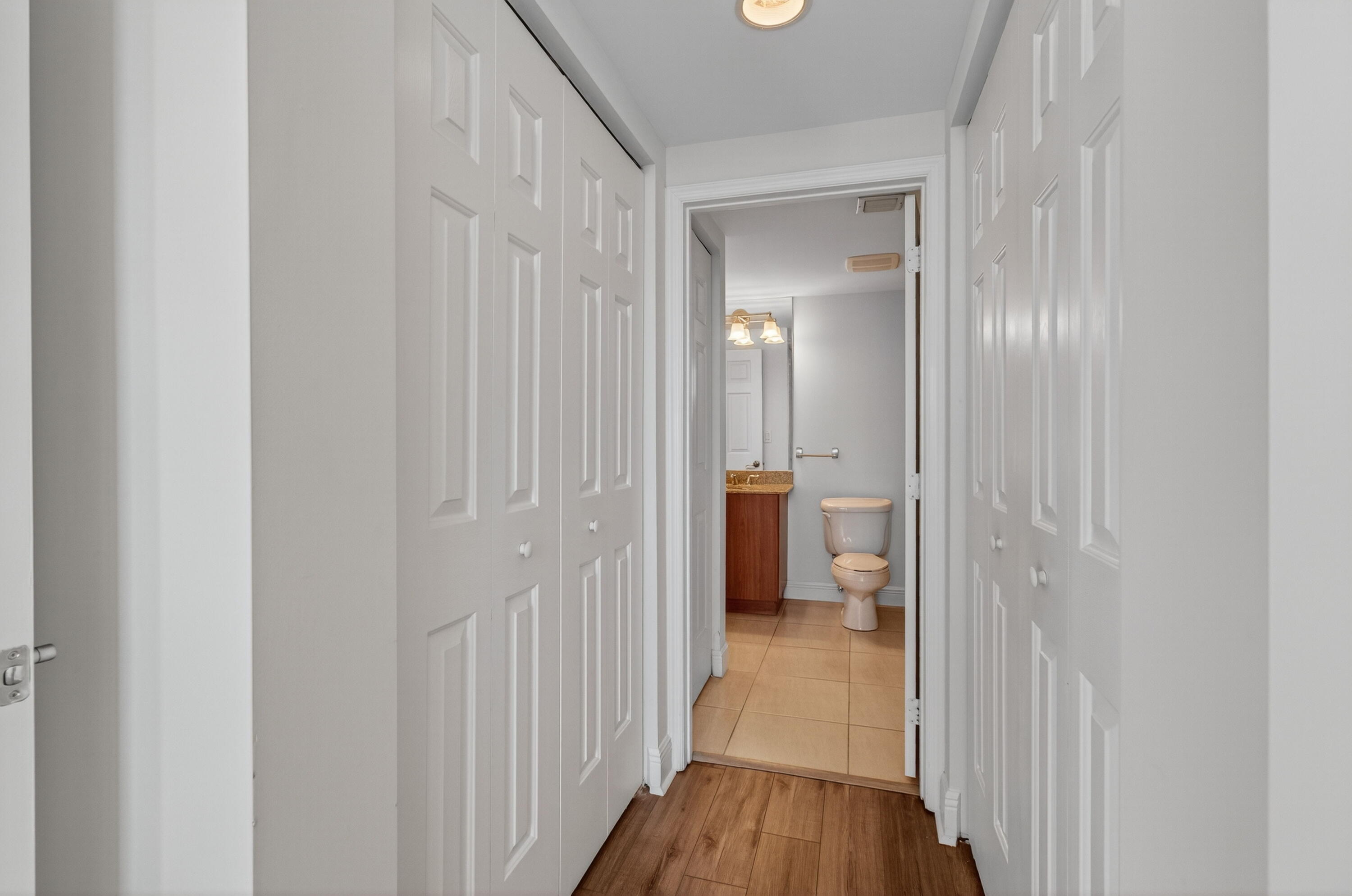610 Clematis Street, Unit 532 West Palm Beach, FL 33401 - Photo 46 of 63 a view of a bathroom from the hallway