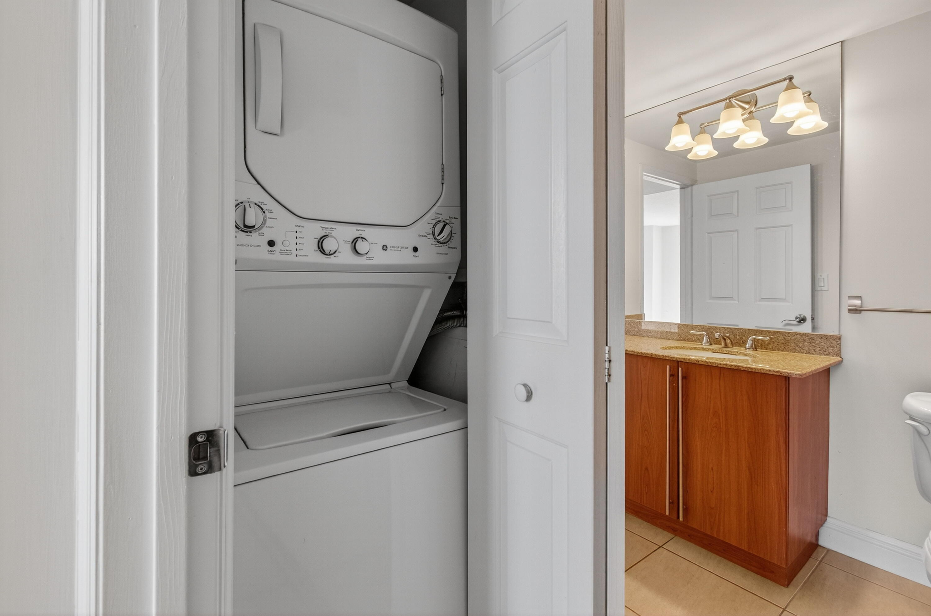 610 Clematis Street, Unit 532 West Palm Beach, FL 33401 - Photo 51 of 63 a view of washer and dryer