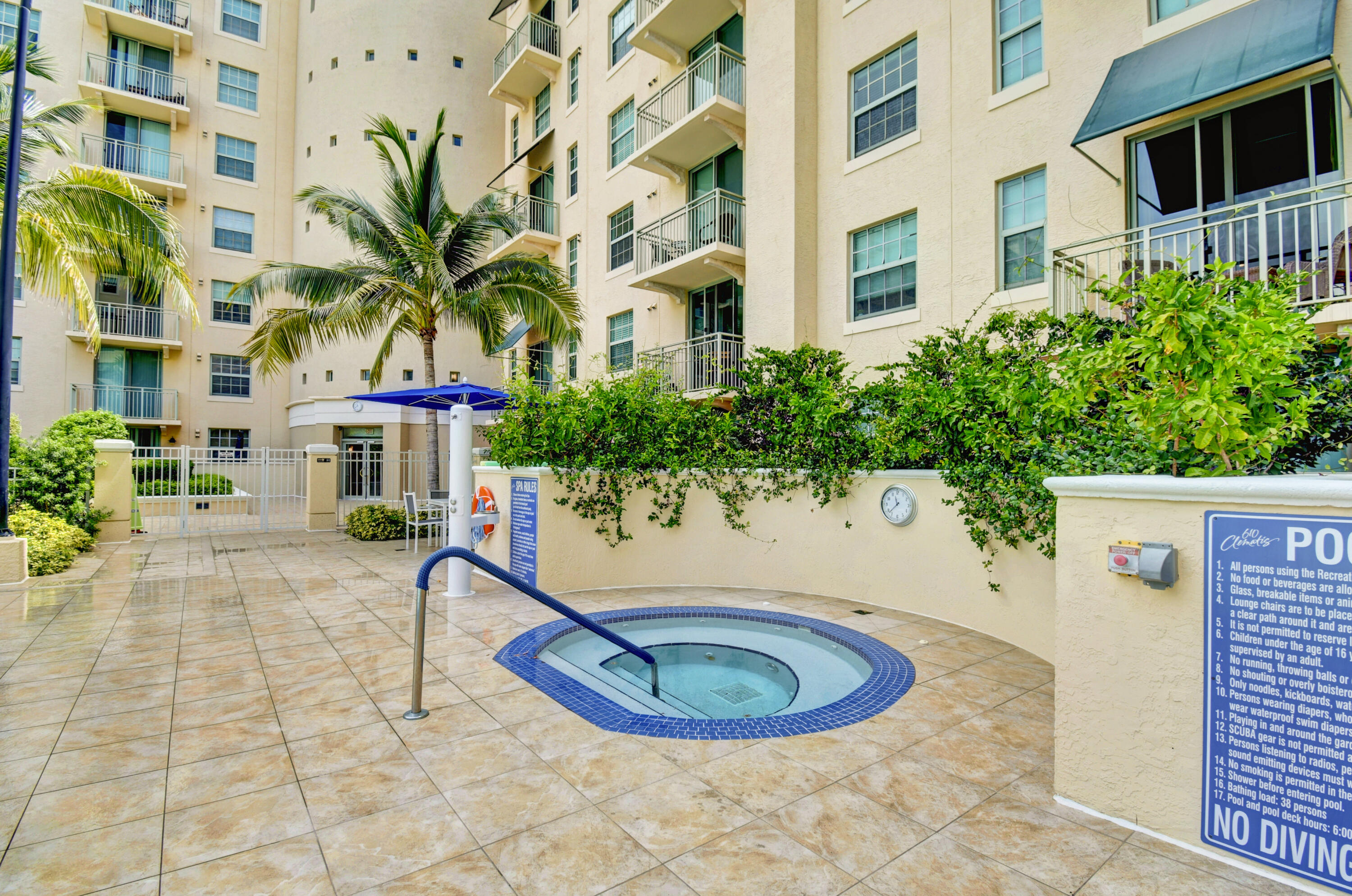 610 Clematis Street, Unit 532 West Palm Beach, FL 33401 - Photo 60 of 63 a view of a swimming pool with chairs