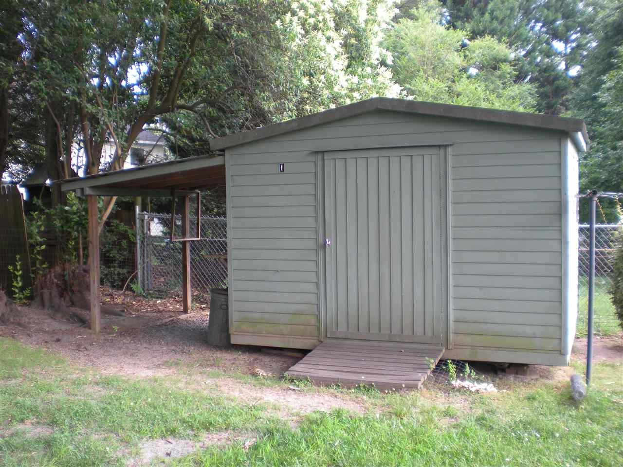 4108 Rockingham Drive Raleigh, NC 27609 - Photo 12 of 13 Storage Shed