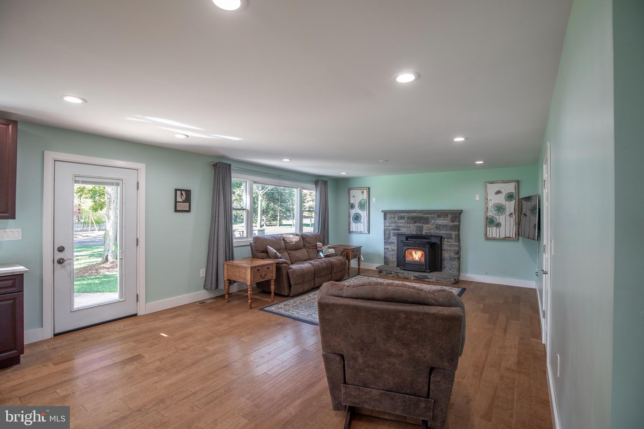 1482 Sugar Bottom Road Furlong, PA 18925 - Photo 8 of 62 Family Room with Pellet Stove
