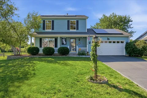 a view of a yard in front of a house