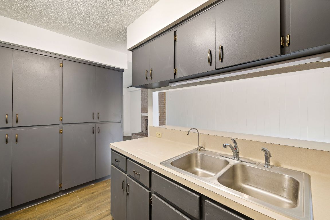 2402 Cottonwood Drive, Unit B Georgetown, TX 78628 - Photo 12 of 20 a close view of sink and tap