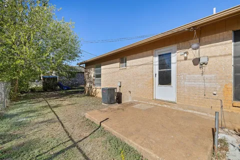 a view of a house with a patio