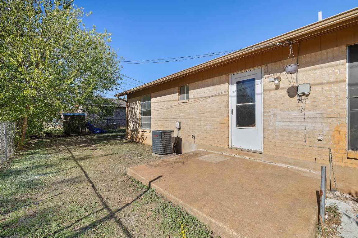 2402 Cottonwood Drive, Unit B Georgetown, TX 78628 - Photo 18 of 20 a view of a house with a patio