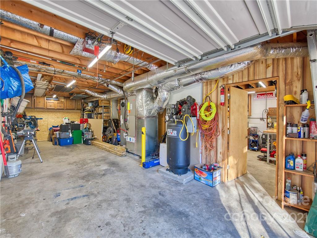 17 Royal Ridge Road Clyde, NC 28721 - Photo 37 of 38 a view of a garage with storage